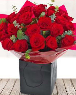 24-red-roses-Aqua-packed-hand-tied-Bouquet-£110.00